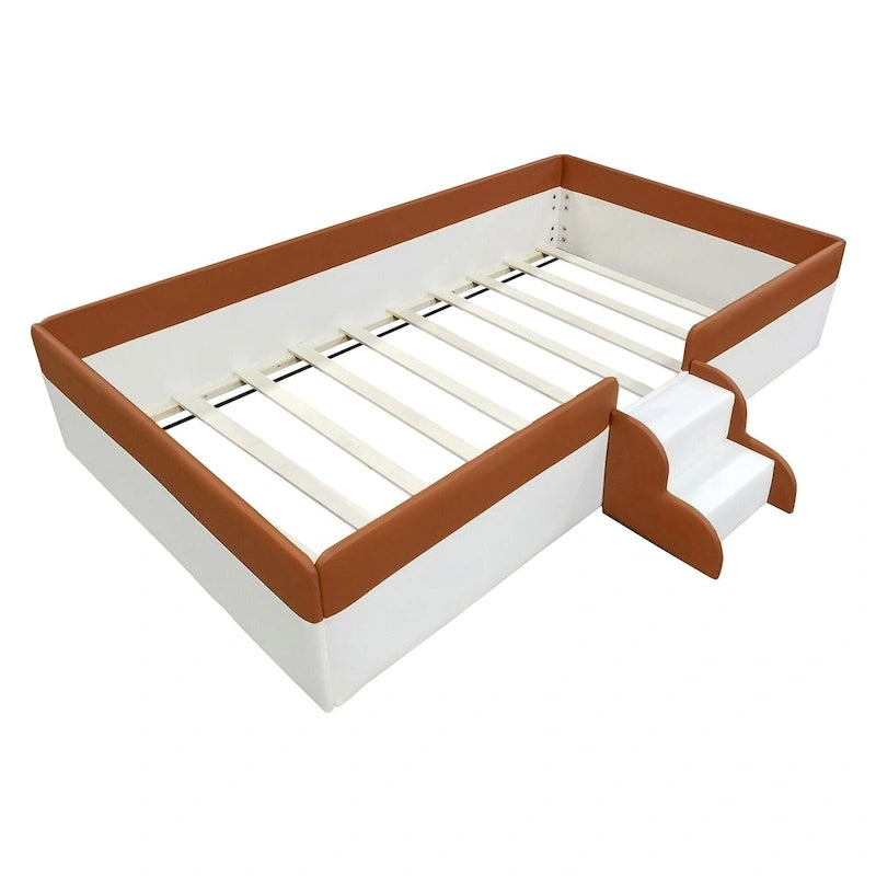 Cama de suelo infantil con barandillas, estructura de diván tapizada en PU, cama con panel de listones de madera y pequeña escalera para niñas y niños