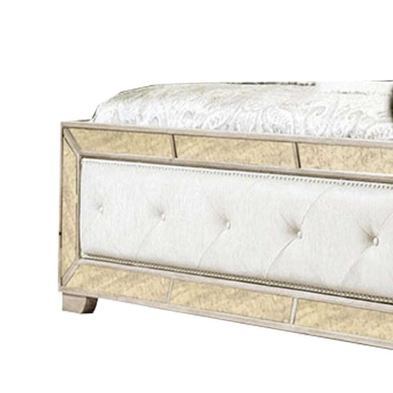 Cama de madera tapizada en cuero sintético, dorado y plateado