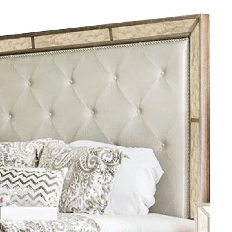 Cama de madera tapizada en cuero sintético, dorado y plateado